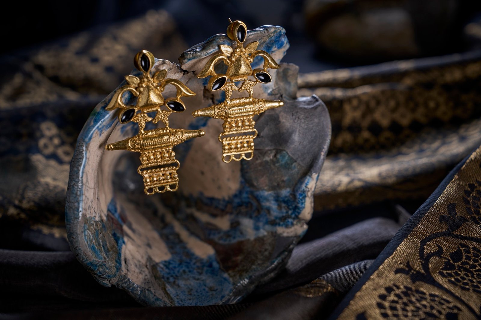 Earrings temple design three black enamel