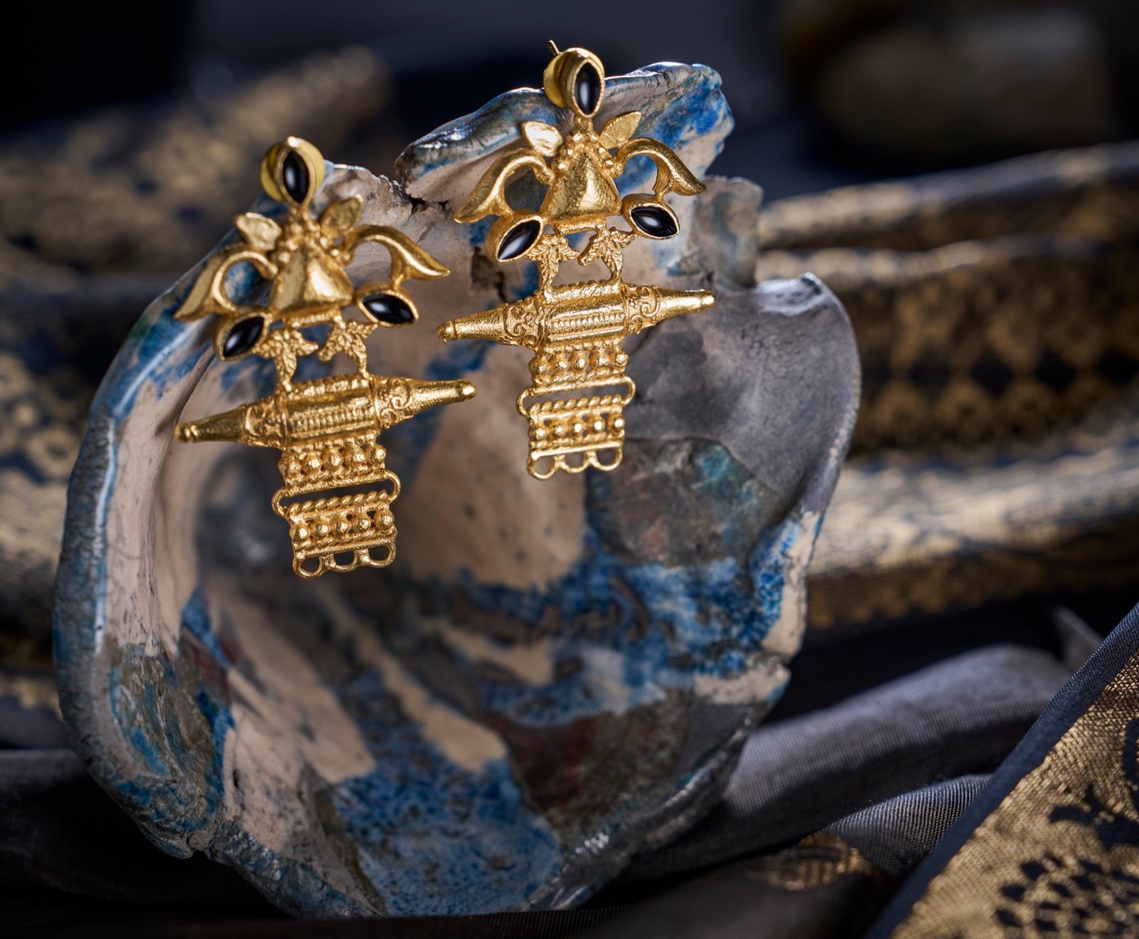 Earrings temple design three black enamel